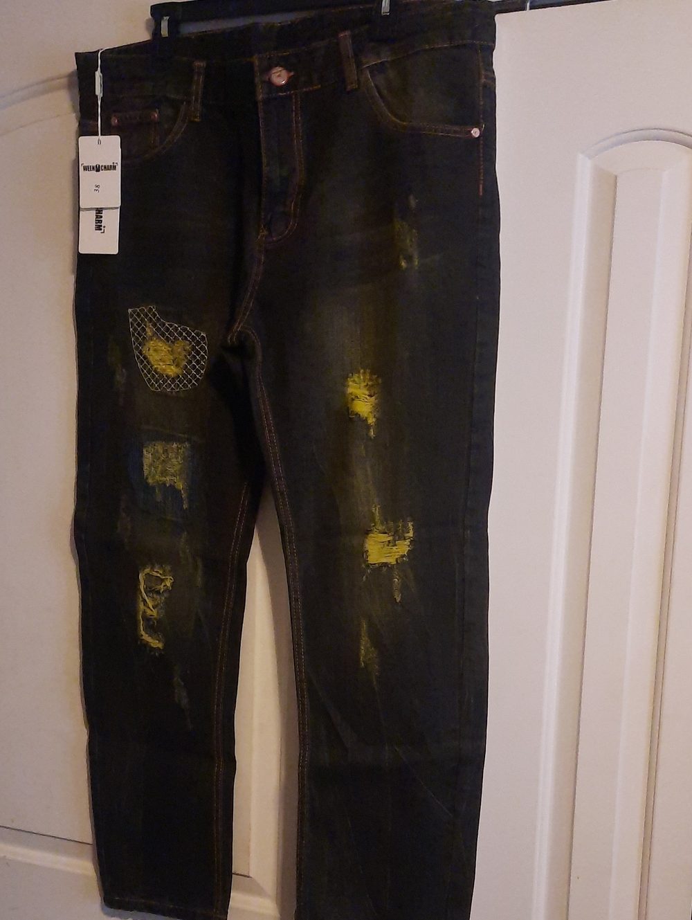 Men's Distressed Black Jeans with Yellow Paint Detail